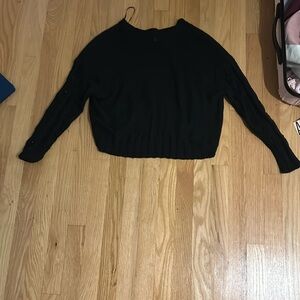 Black sweater with lacy sleeves